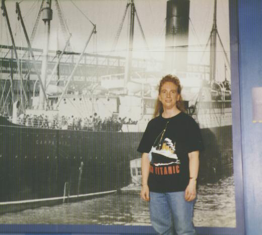 Standing in front of the photo of the Carpathia